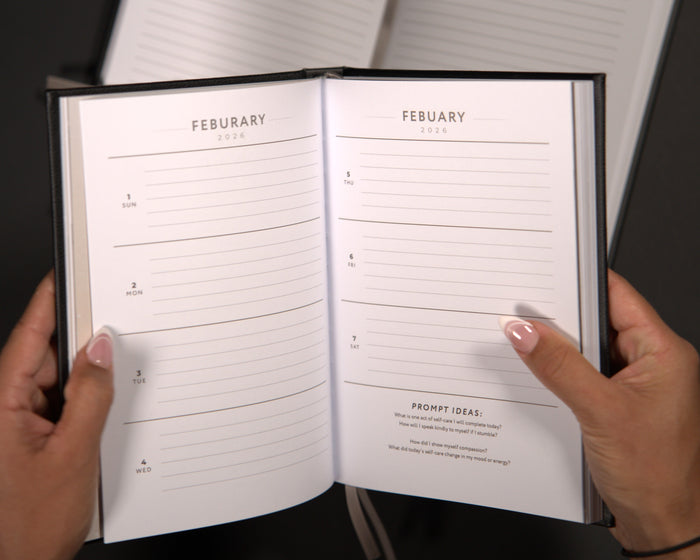Elevare Collective journal open to weekly spread