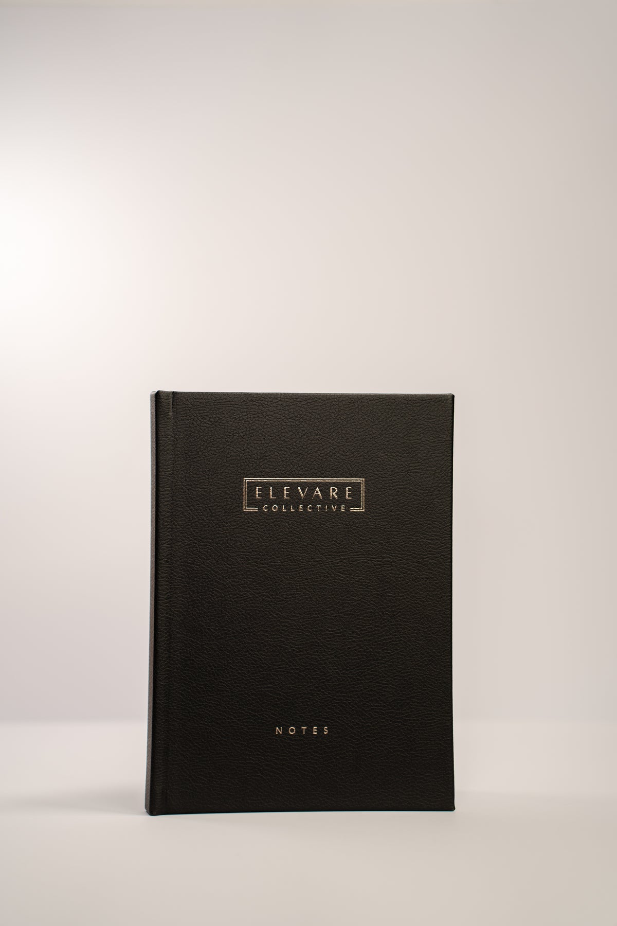 Elevare Collective Notebook — desk styling shot